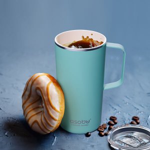 Donuts with coffee on a dark stone background. toning. selective focus